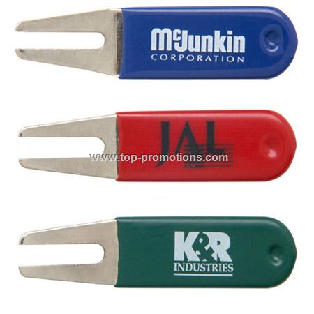 Rubber coated nickel plated bent divot repair tool