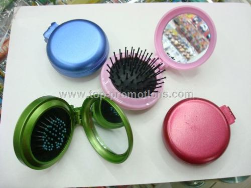Portable mirror with brush kit