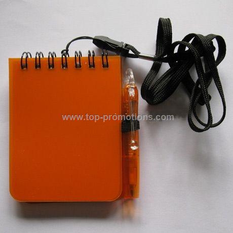 notebook with pen and lanyard