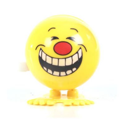 Wind Up Jumping Toy Yellow Faces
