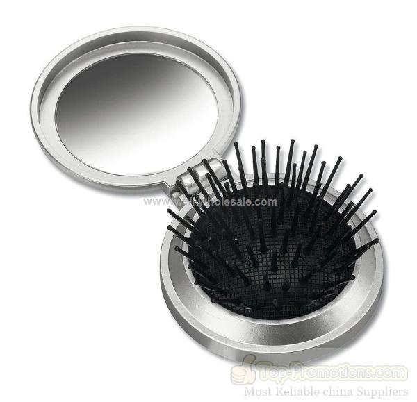 Foldable hairbrush with mirror