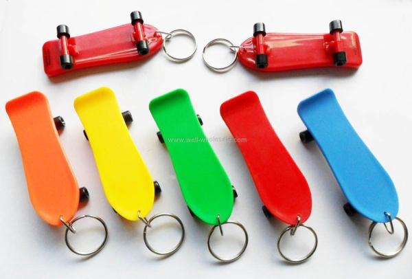 Plastic skateboard keychain