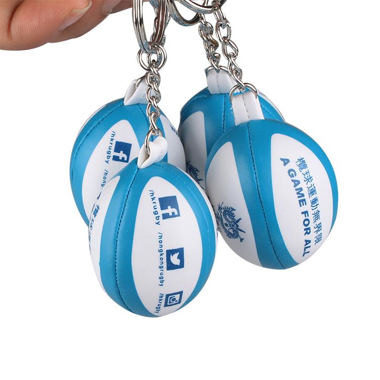 Promotion soft PVC Leather mini rugby ball keychains with custom Logo