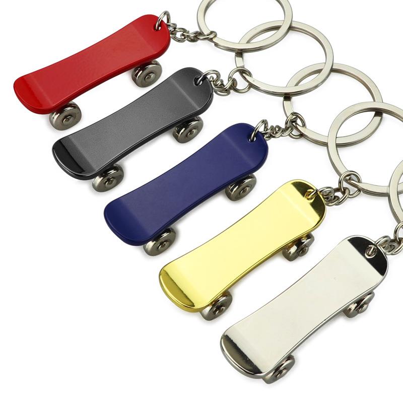stock Creative fingertip skateboard metal keychain Car gift key chain